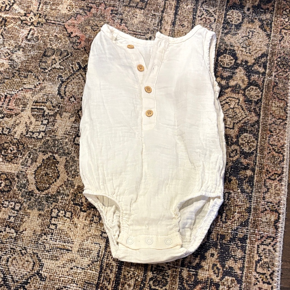 Sleeveless Cream Button-Front Baby One-Piece Romper